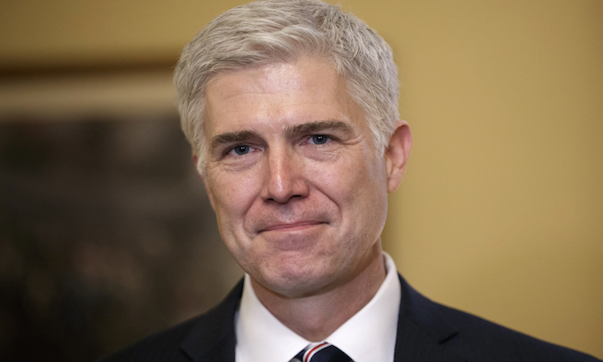 Gorsuch establishing his position on the right of the bench