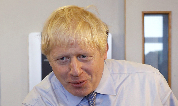 UK’s Johnson warns of tougher measures in COVID-19 fight