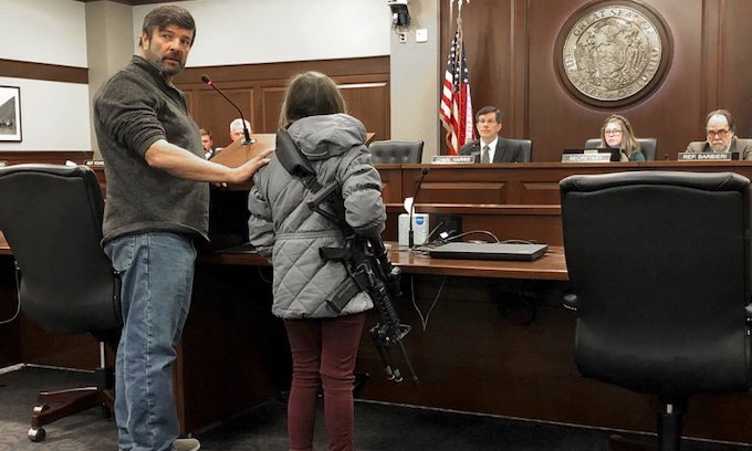 Girl, 11, brings AR-15 to Idaho hearing on gun legislation
