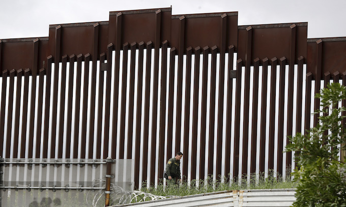 Biden reverses course, allows border wall construction to resume