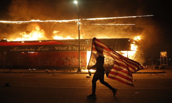 In 2nd night of rioting Minneapolis police precinct abandoned, torched, businesses burned
