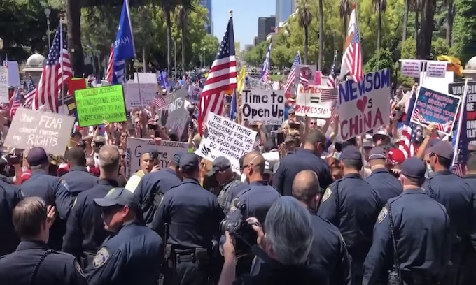 California Rebels: Protesters face off with cops at capitol as they demand freedom