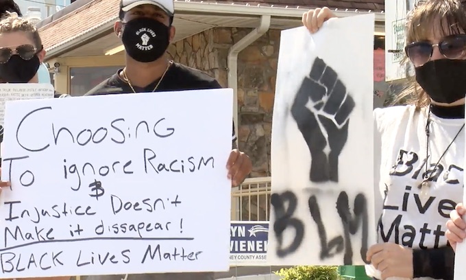 ‘It has no place.’ Black Lives Matter brings protest to Branson’s Dixie Outfitters