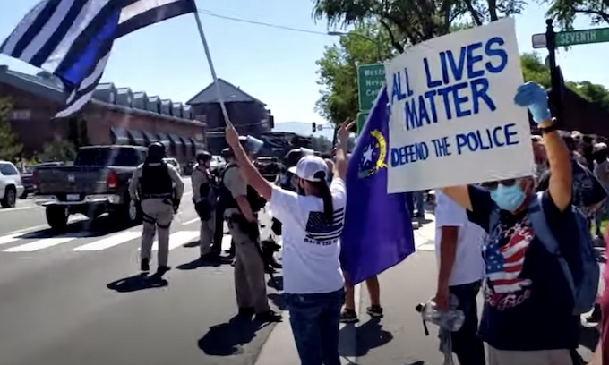 BLM protesters met with jeers by armed crowd of counter protesters in Nevada city