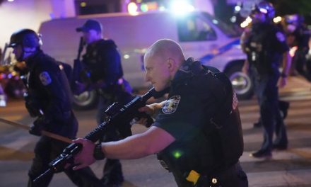 Two police officers shot in Louisville race riot