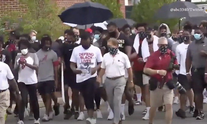 Nick Saban leads Alabama football team on march for social justice