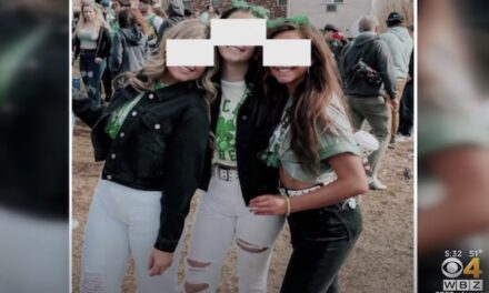 UMass students suspended over photo that shows them off-campus without masks