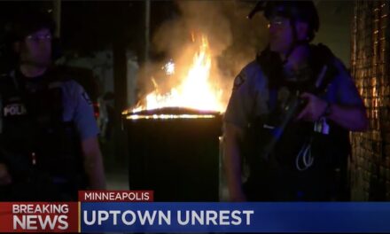 Man who drove at Minneapolis protesters charged with murder