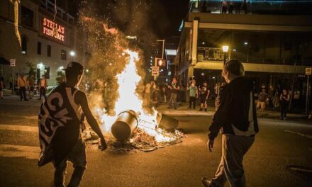 Driver hits anti-police protesters in Minneapolis