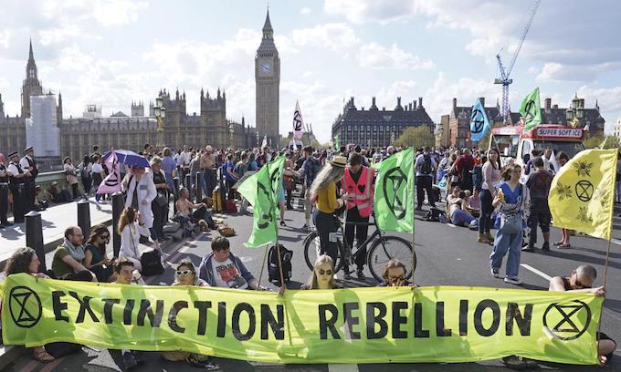 Climate activists block London bridges, UK oil terminals