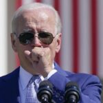 Biden plays down classified documents scandal, blames his staff