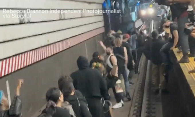 Thirteen people charged after Jordan Neely protesters line up on NYC subway tracks